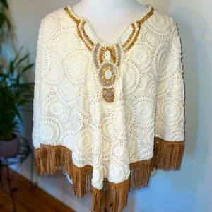 Castings fur and fringe poncho